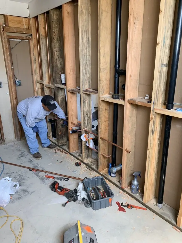 Commercial rough-in plumbing for Water Heater Replacement in Oak Island